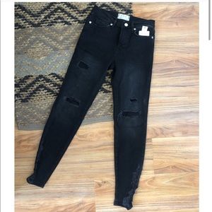 Free People black distressed jeans size 25
